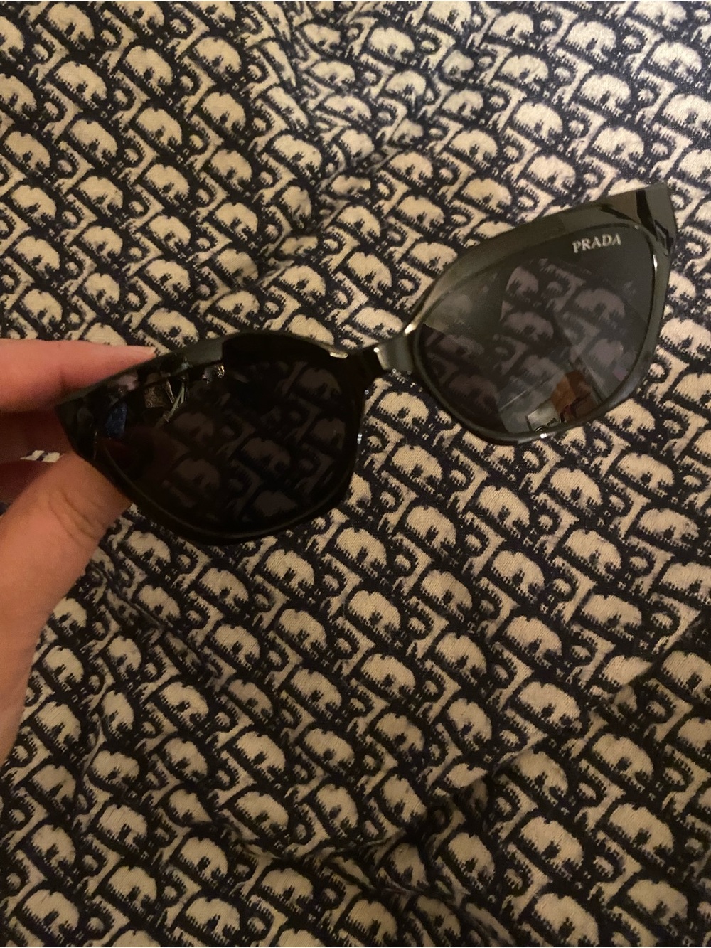 Prada Black Cat-Eye Sunglasses with Dark Lenses